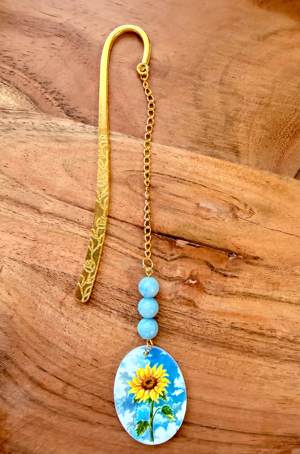 Aquamarine Crystal Bookmark With Sunflower Charm – Gold Tone